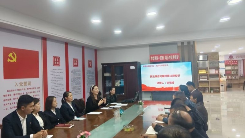 新疆巩留县司法局党支部联合九龙河建材市场党支部开展3月主题党日活动