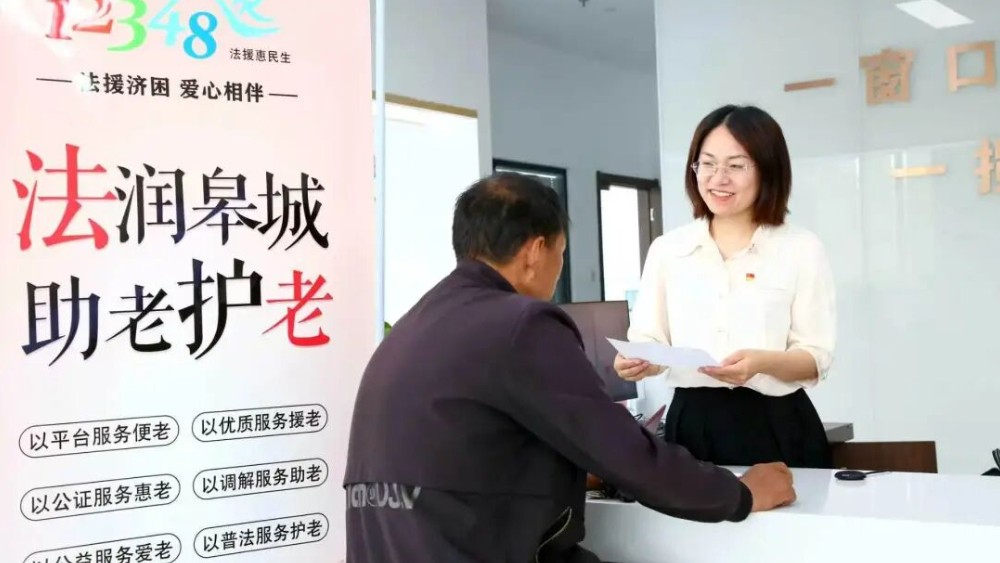 金雅萍：将法治温暖不断传递