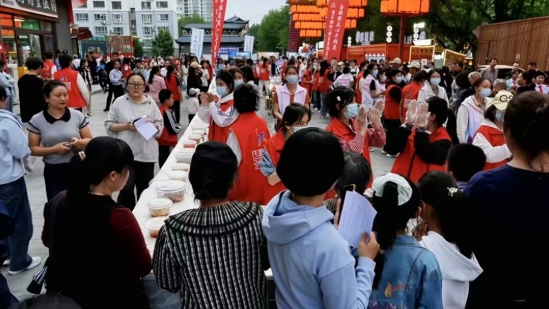新疆奎屯市司法局：百家宴里品温情 趣味普法润民心