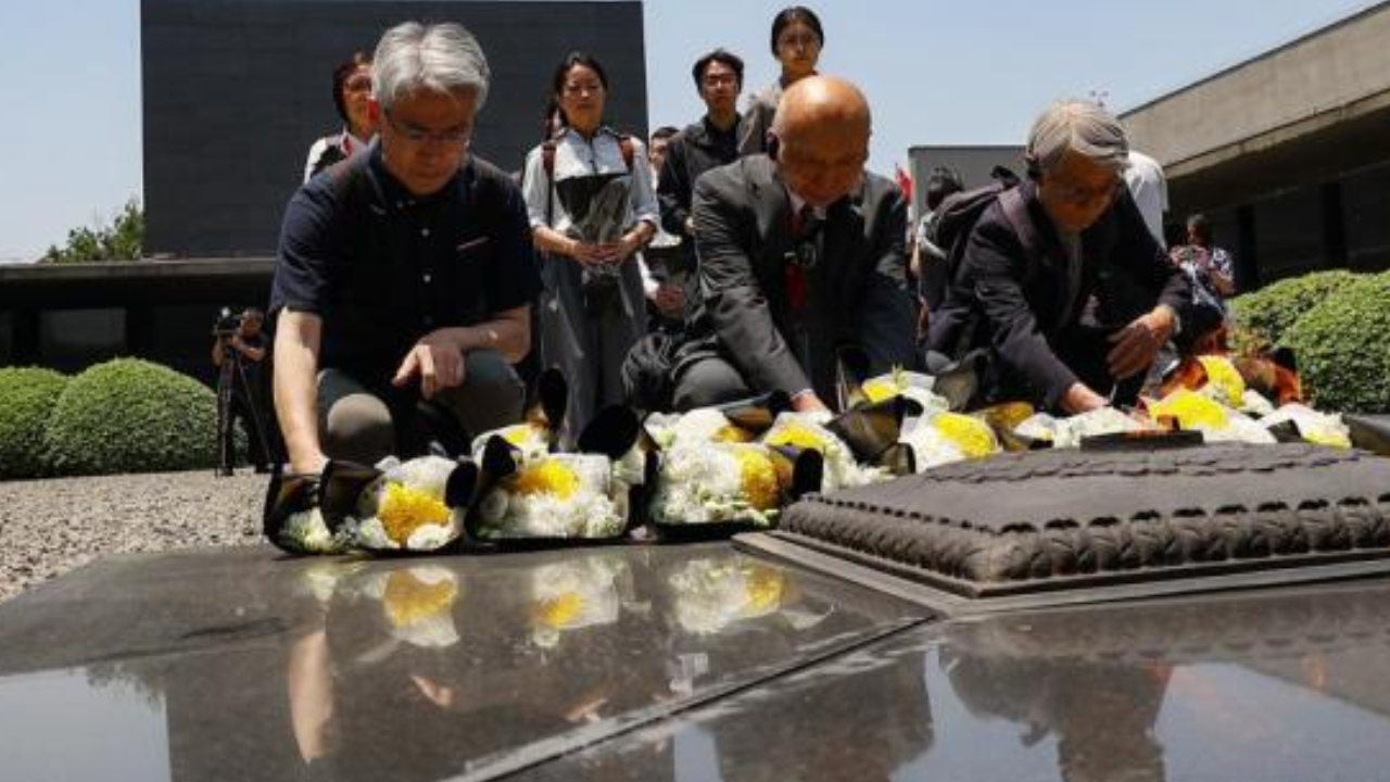 中外专家学者走进侵华日军南京大屠杀遇难同胞纪念馆共忆历史祈愿和平