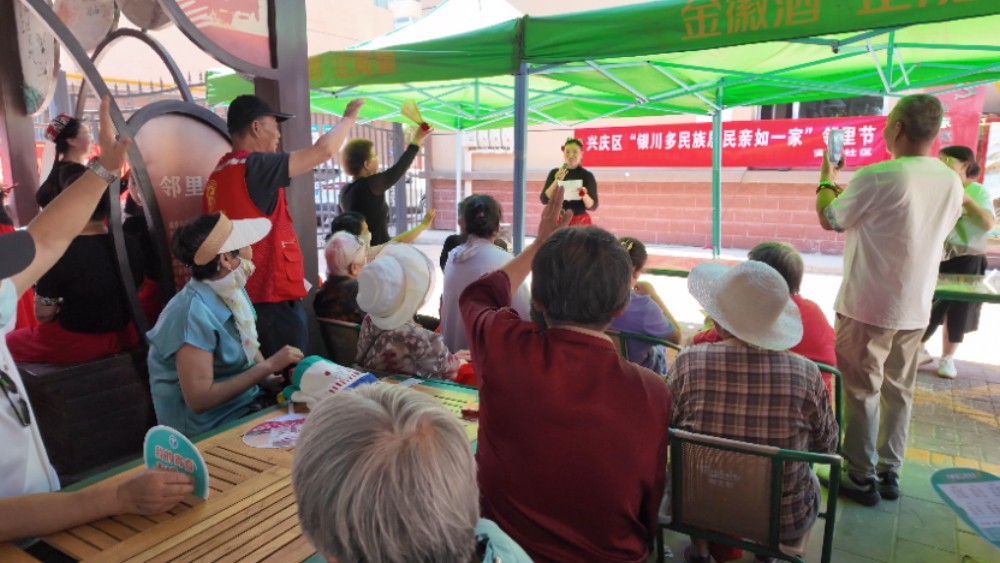 银川市兴庆区安秀社区：邻里节里话温情 反诈宣防进万家