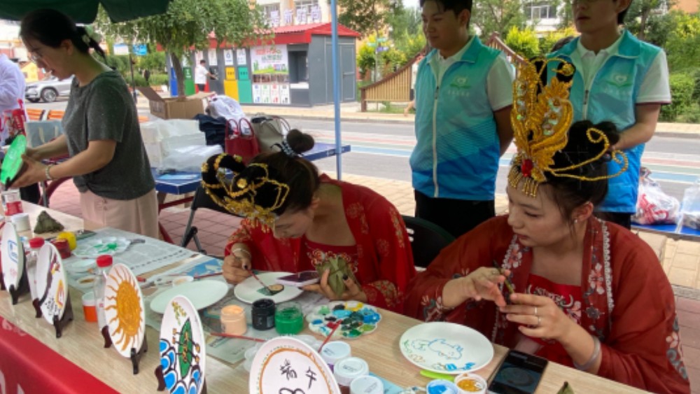 银川市西夏区伊地社区：粽香四溢迎端午佳节 法治护航筑平安社区