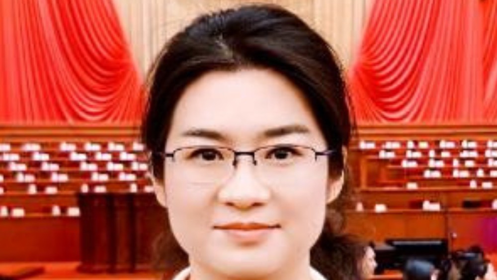 做扎根乡村的一颗“钉”