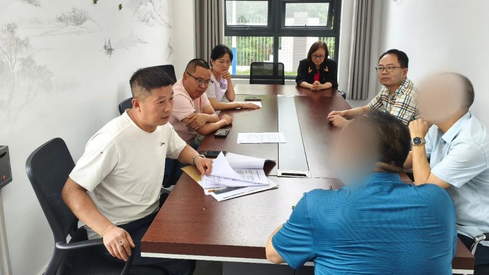 法庭+综治中心“接力调解” 两家企业“握手言和”