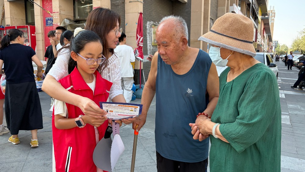 银川市兴庆区泰和社区：小小志愿者齐上阵 反诈宣传护民生