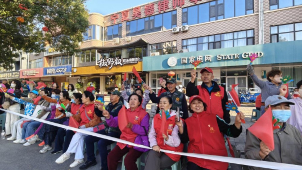 吴忠市利通区金花园社区：党建引领聚合力 激情助威展风采