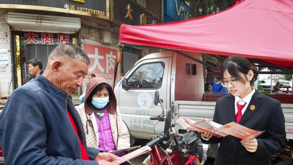 甘井法庭：集市普法“赶大集”，扫黑除恶宣传入人心