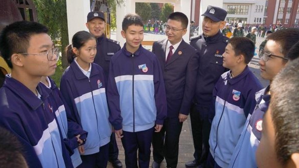法治护航运动场 普法守护少年心