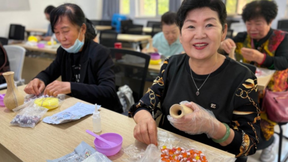 银川市金凤区唐徕社区：彩砾凝匠心 石榴聚同心