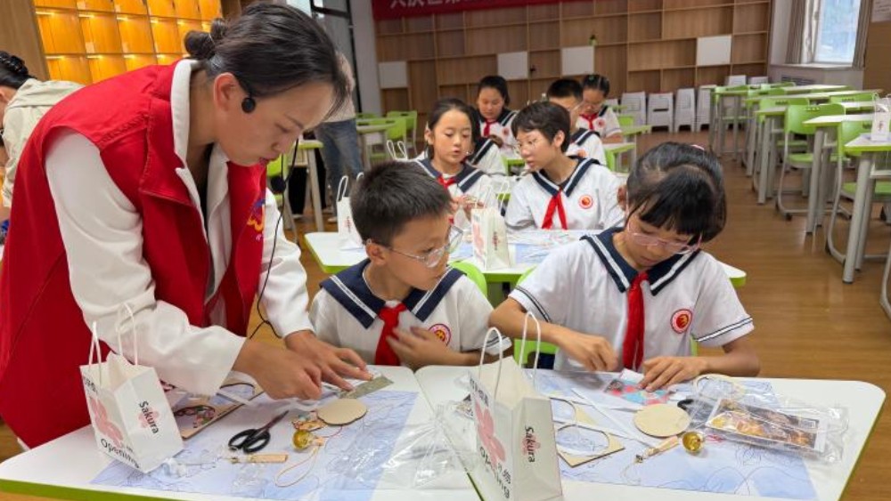 银川市兴庆区信义社区：指尖传非遗 铃响润童心