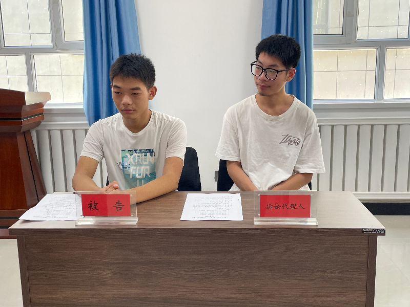 8月12日,一二七团司法所联合育才路社区共同开展“模拟法庭”活动。 (3).jpg